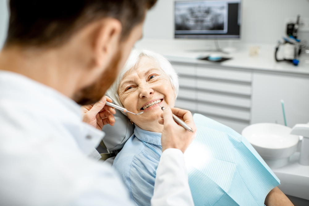 Older adult getting regular check-up.